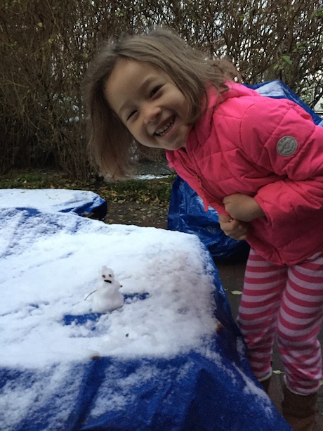 Maile's very first snowman - just a wee little guy...