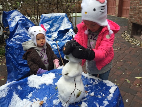 Maile and Lauren working on snowman #2...