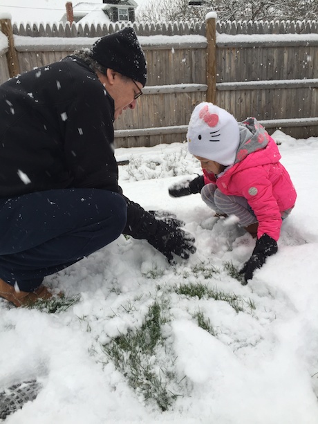 Papa and Maile hard at work with snowman #3