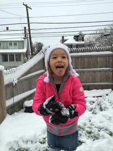 Maile Girl catching snow flurries with her tongue...