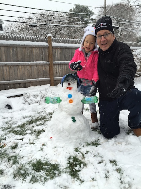 Maile and Papa with their finished product  - a recycle friendly Olaf :)