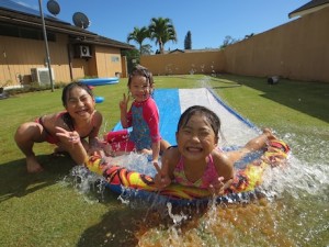 Katie, Maile and Emily posing post slide. (Lauren was inside napping...)