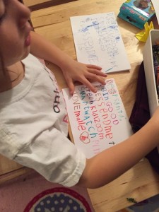 Maile Girl hard at work on her first letter to Santa...