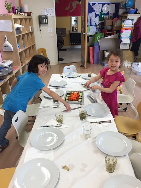 Maile and her friend, Zoe, getting the table all setup.