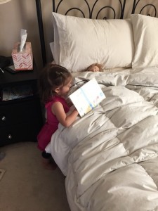 Reading books to one of our babies...