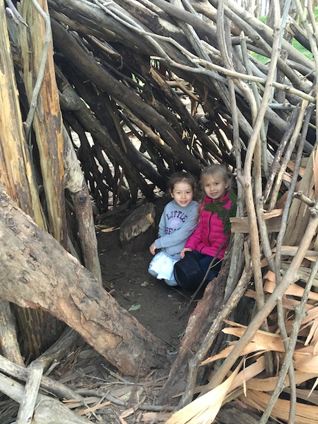 Maile and Julianne found a little stick hut and had fun playing house...