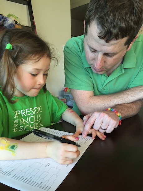 Maile and Daddy talking strategy for the Midwest region...