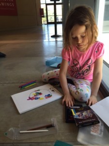 Maile working on her first piece of art for the day - a very colorful gumball machine.