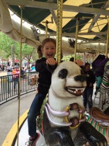 Maile likes going on the merry go round solo now...