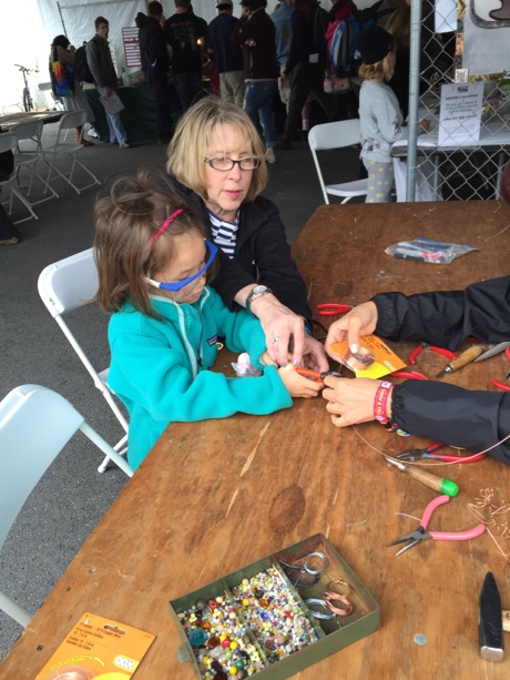 Maile and Grandma hard at work on a copper bracelet.