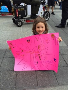 Maile and the sign she made for Christine all be herself...