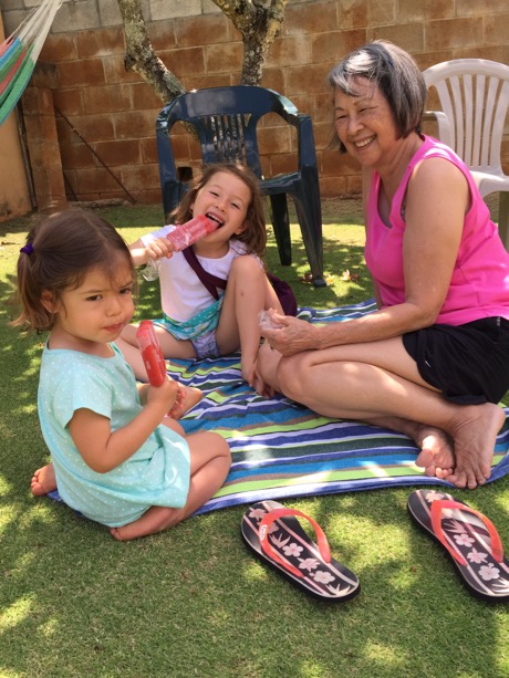 Enjoying a popsicle break with Grandma Gail...