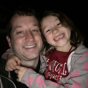 Daddy and Maile - all smiles after a fun time at the parade :)