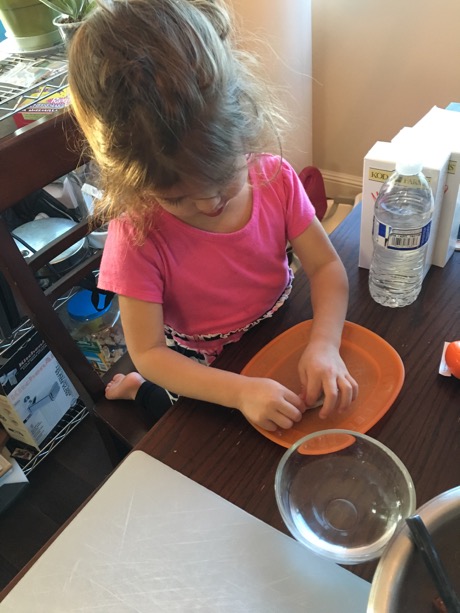 Lauren working hard on her first dumpling...