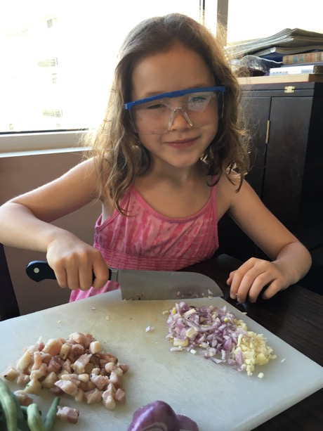 While preparing dinner, Maile was introduced to the sting of onion chopping so she went and grabbed these protective googles and they helped!