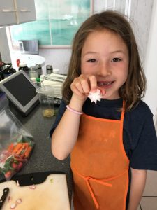 Showing off her radish flower!