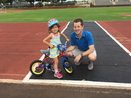 Our little bike rider and a very proud daddy!