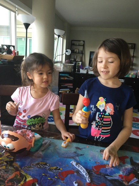 Maile and Lauren getting their dentist training in with the play doh set...