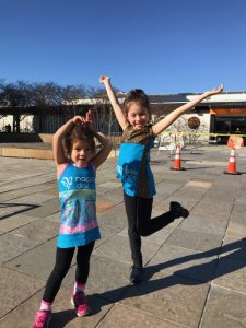 Maile and Lauren striking a pose on our way to their performance!