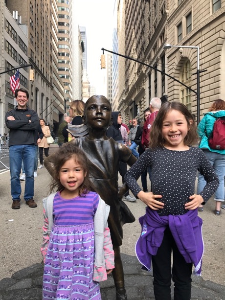 Maile and Lauren meet the Fearless Girl down near Wall Street
