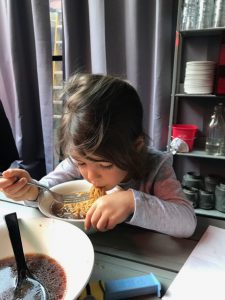 Lauren enjoying some seriously good ramen at Ivan Ramen